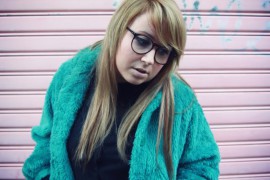 Veste en fausse fourrure turquoise